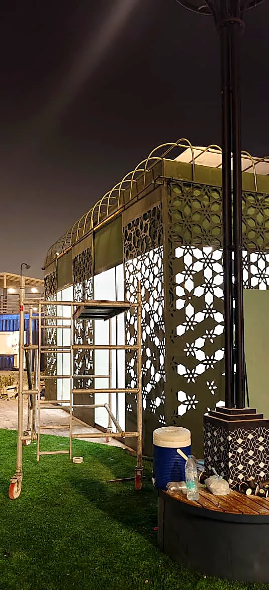 Cut pattern panels on a lit kiosk