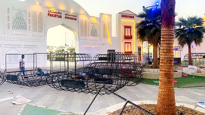 Steel kiosk frames being installed at a festival