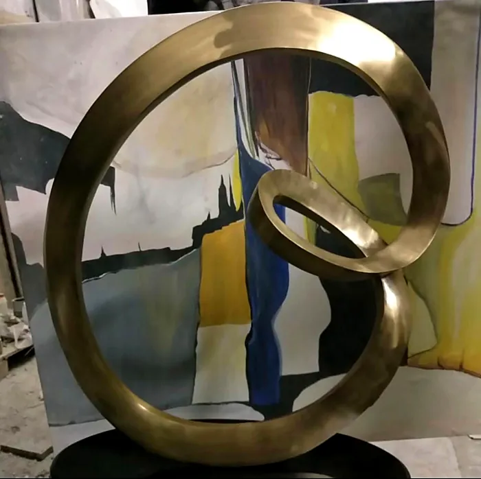 Polished gold ring sculpture