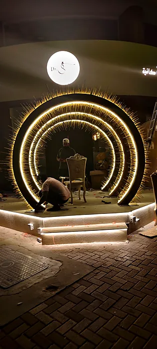 Lit concentric ring entrance to a restaurant