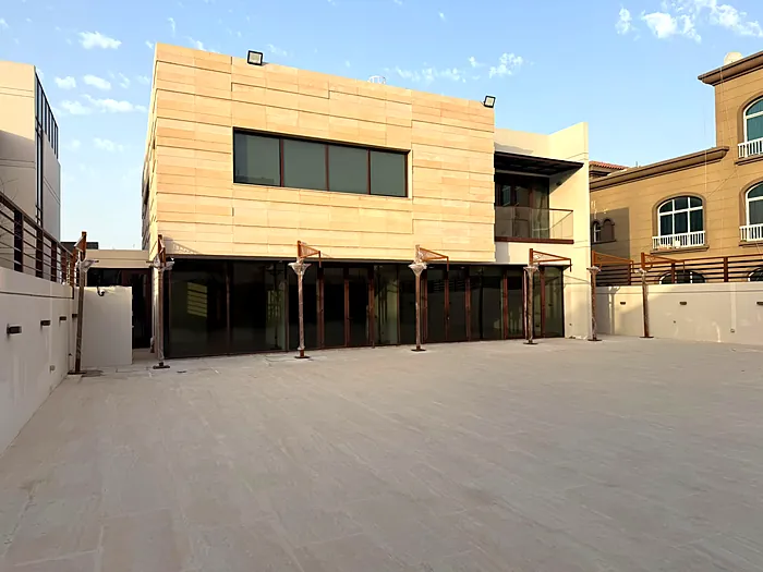Pergola structure over a courtyard walkway