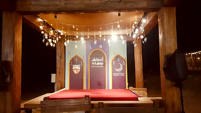 Ramadan majlis stage with arches and fairy lights