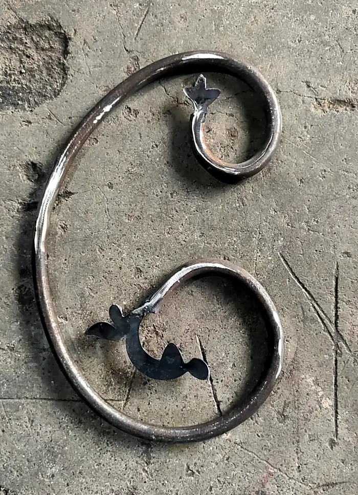 Hand-formed decorative steel scroll