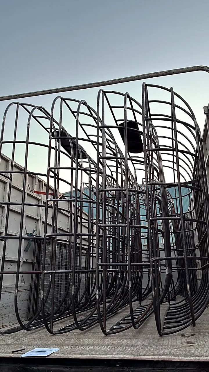 Curved tube frames loaded for delivery